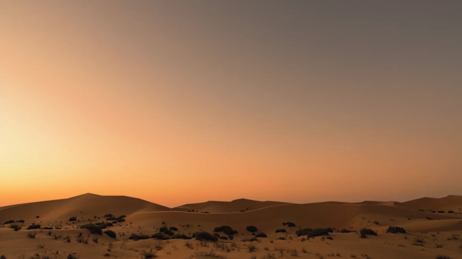 A meteor crossing the night sky above desert rock formations — the Meteor Dash title sequence.